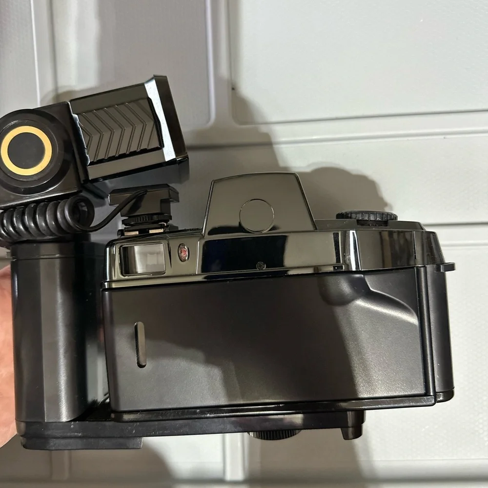 Vintage Canon Motor Drive Red Eye Reduction Black Camera with flash
